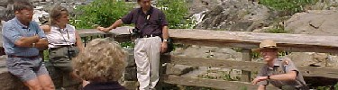 Photo of NPS employee giving a geology demonstration